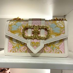 DO NOT BUY!! Looking for this Aldo pink, blue and gold crossbody bag!